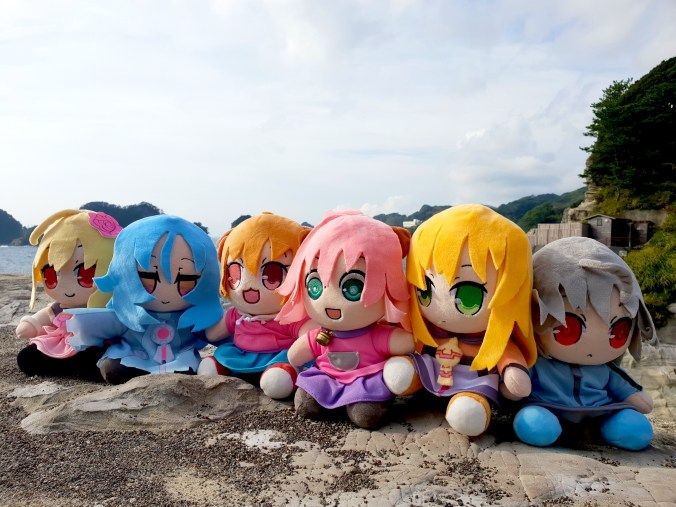 A group photo of all wave 1 plushies
